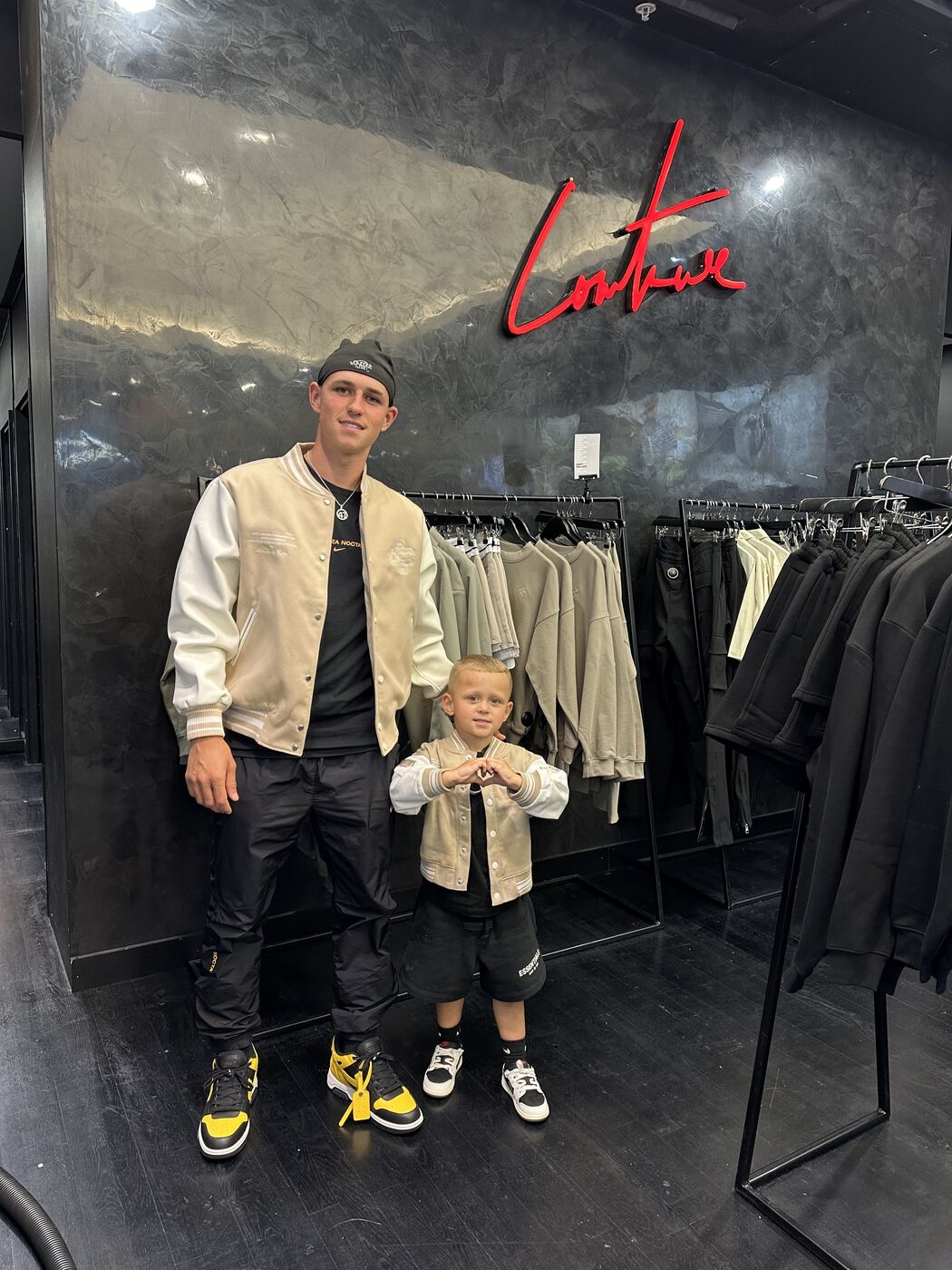 Phil Foden in The Couture Club store